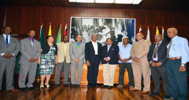 President David Granger, Prime Minister Moses Nagamootoo and Minister of Communities Ronald Bulkan with the new Mayors. [Adrian Narine photo]