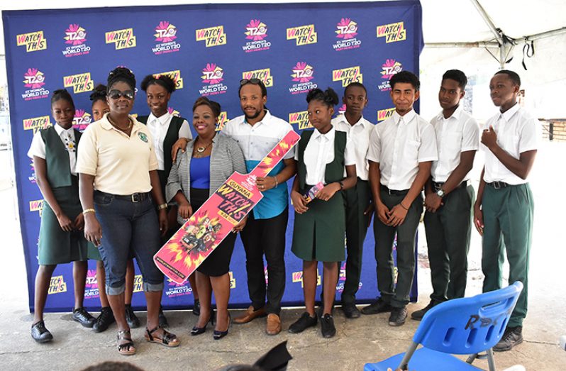 Linden Mayor, Waneka Arrindell (centre), and Member of Parliament Jermaine Figueira with students of Mackenzie High School on Tuesday in Mackenzie (ICC WWT20. (John Ramsingh photos)