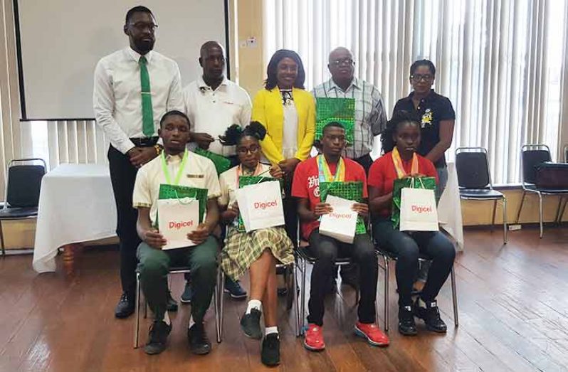 Front row: Guyanese athletes at the Special Olympics earlier this year in Dubai. Back row from left: Director of Sport Christopher Jones, Mark Scott, Melissa Tucker, Wilton Spencer and Vidya Sanichara.