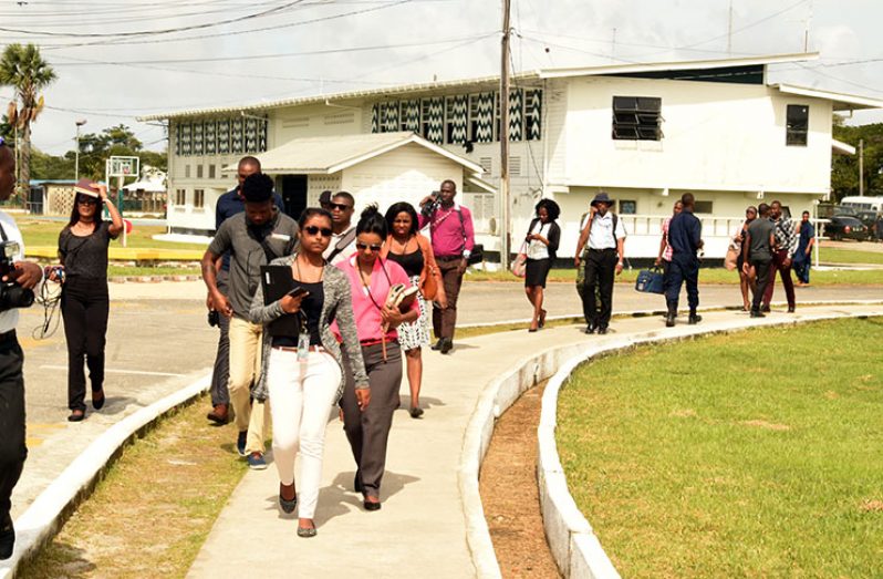Media operatives walking out of Base Camp Ayanganna after being met with disrespect by the organisers of the conference