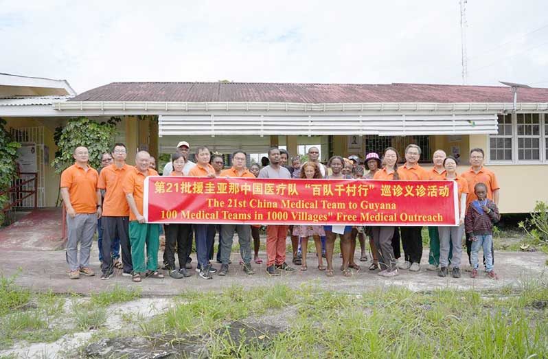 The members of the 21st Chinese Medical Team, who recently participated in the comprehensive medical outreach at the Yarrowkabra Health Post