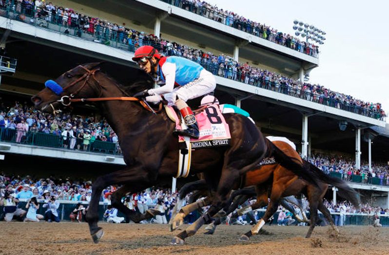 John Velazquez aboard Medina Spirit (8) wins the 147th running of the Kentucky Derby at Churchill Downs, May 1, 2021, Louisville, Kentucky, USA. (Mandatory Credit: Michael Clevenger-USA TODAY Sports/File photo)