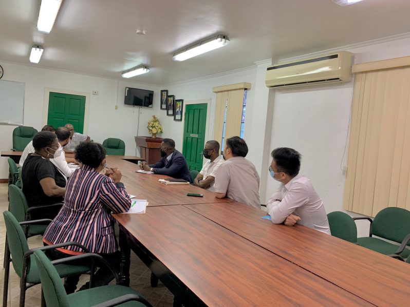 Labour Minister, Joseph Hamilton and Chief Labour Officer, Dhaneshwar Deonarine during the meeting with representatives of GAWU and the Demerara Timbers Limited on Tuesday