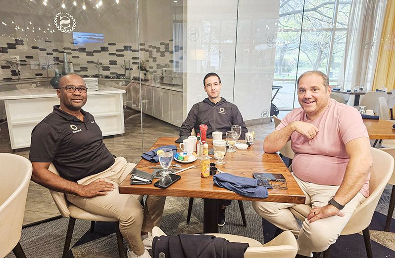 GFF President Wayne Forde (left) meets with FIFA Vice-President and Concacaf President Mr. Victor Montagliani (right), and Concacaf Deputy General Secretary Mr. Marco Leal (centre)