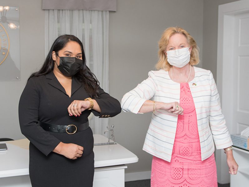 First Lady of the Cooperative Republic of Guyana, Arya Ali and US Ambassador, Sarah-Ann Lynch, greet each other on Monday (Office of the First Lady photo)