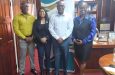 Archery and GSSF’s Vidushi Persaud-McKinnon and Director of Sport Steve Ninvalle, second and third left, respectively, with Assistant Directors Frankie Wilson (left) and Melissa Dow-Richardson (fourth left)
