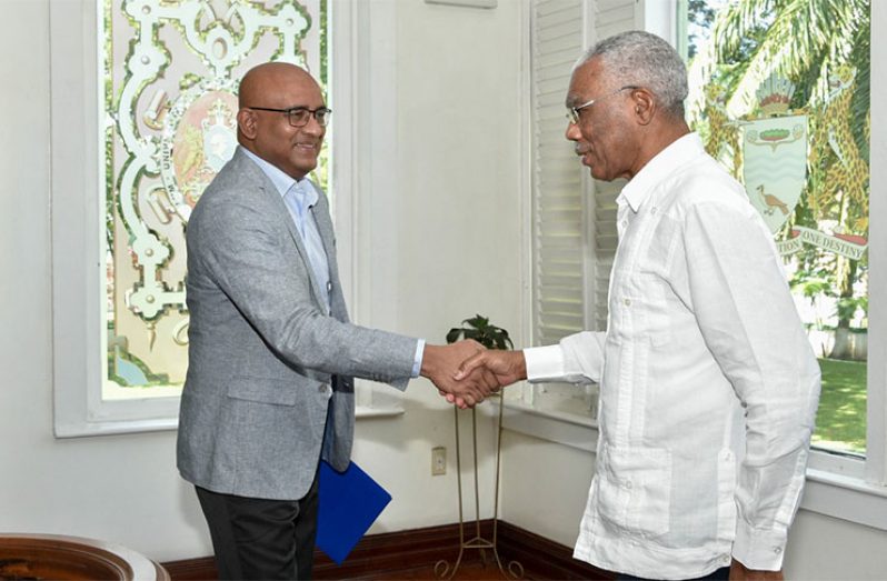 President David Granger greeting Leader of the Opposition, Bharrat Jagdeo on his arrival at State House on Friday (MoTP Photo)