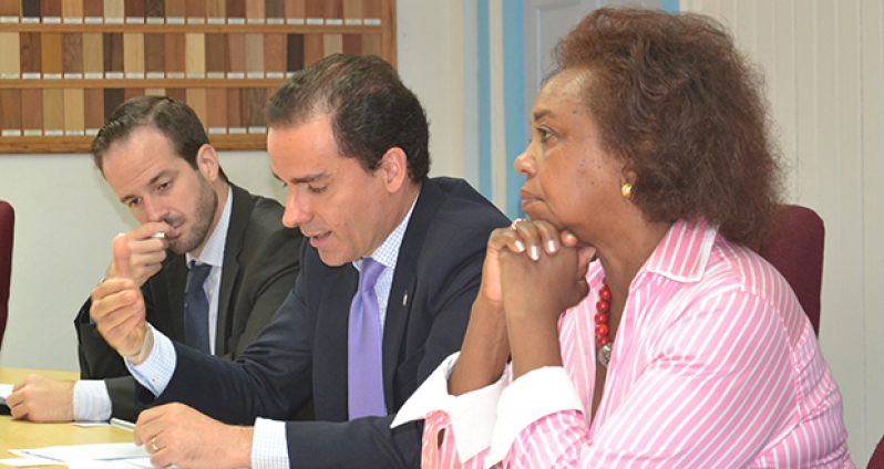 UNODC official Amado Philip de Andres, centre, and UN Resident Coordinator Khadija Musa, right, at the meeting earlier today.