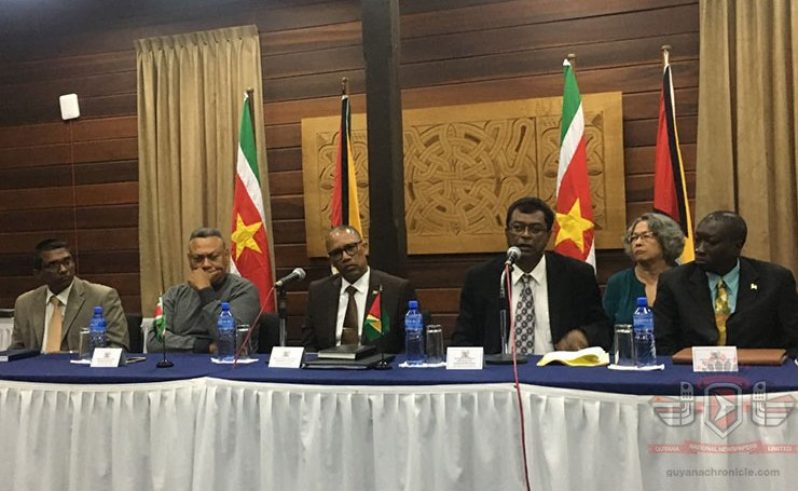 Minister of Public Security, Khemraj Ramjattan (third from right) as he addressed the media in Suriname. From left are  Suriname's Minister of Agriculture, Animal Husbandry and Fisheries, Lekhram Soerdjan, Minister of Defense Ronni Benschop, Minister of Justice and Police , Stuart Getrouw, Minister Ramjattan and Guyana's  Ambassador to Suriname, Keith George .