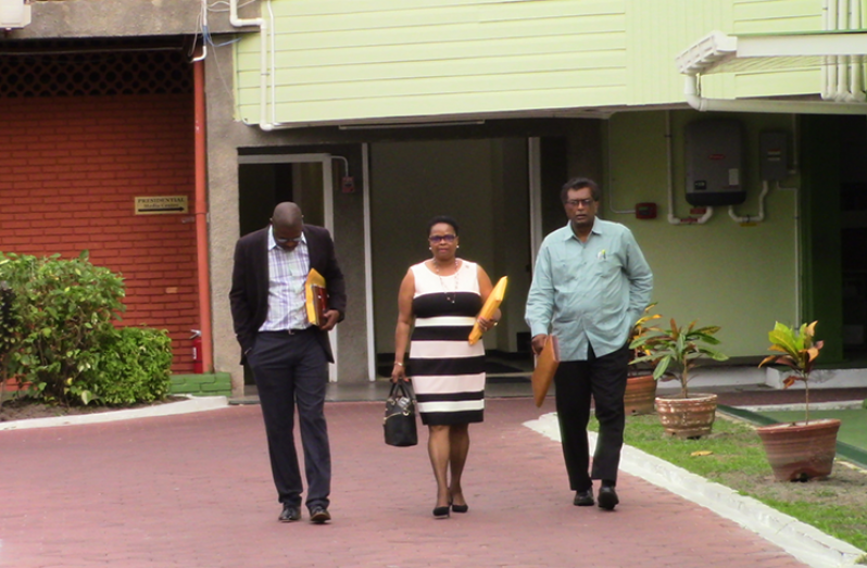 APNU Chief Negotiator Volda Lawrence flanked by AFC lead negotiator, David Patterson (left) and Leader of the AFC, Khemraj Ramjattan (right) as they exited the meeting at the Ministry of the Presidency with President David Granger (Esan Griffith photo)