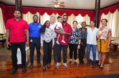 President, Dr Irfaan Ali and Minister Charles Ramson Jr, along with members of the Guyana Hockey Board at State House 