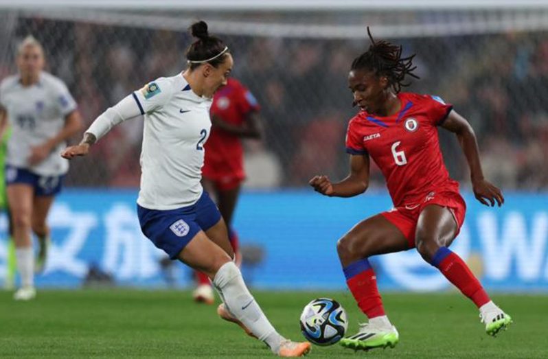 Melchie Dumornay, right, was the standout player in England's game against Haiti.