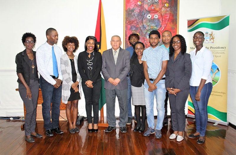 Minister of Social Cohesion, Dr. George Norton, along with members of The Linden Youth Leaders