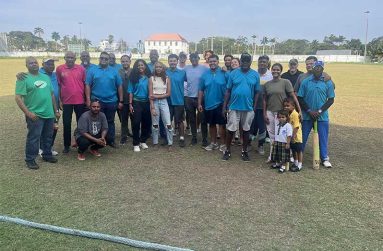 Members of both teams following the completion of the game
