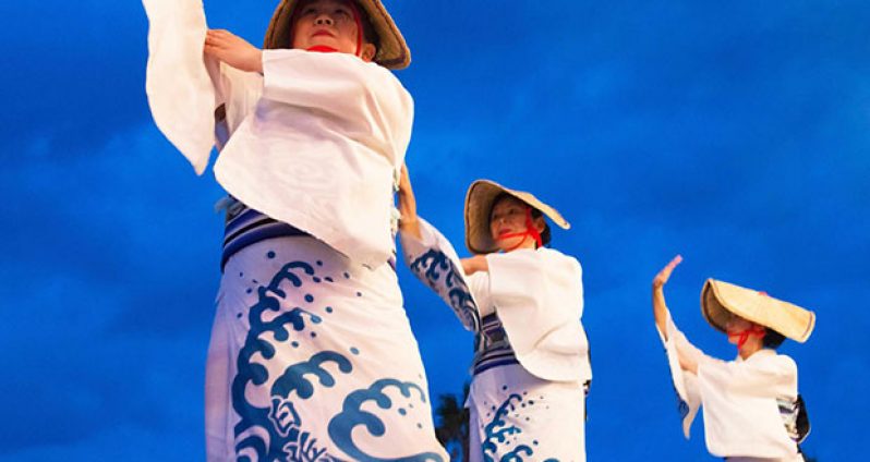 Ama women in traditional clothing dancing (Credit: Keren Su/China Span / Alamy)