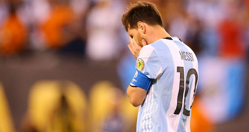 Lionel Messi wipes his eyes after missing his penalty shot in the Copa America Centenario on Sunday. (Goal.Com Photo)