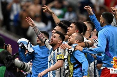 Argentina's forward #10 Lionel Messi and teammates celebrate with the crowd after qualifying to the next round after defeating Netherlands in the penalty shoot-out of the Qatar 2022 World Cup quarter-final football match between Netherlands and Argentina at Lusail Stadium, north of Doha.(AFP)