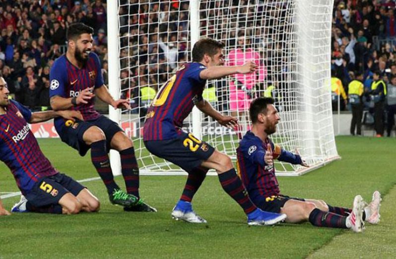 Barcelona's Lionel Messi celebrates scoring their third goal, with Sergi Roberto, Luis Suarez and Sergio Busquets (REUTERS/Susana Vera)