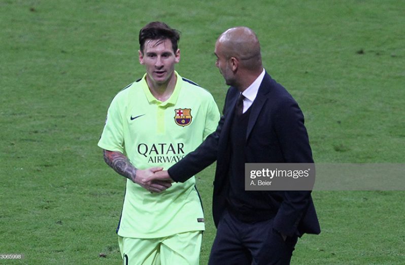 Josep Guardiola shakes hands with Lionel Messi of FC Barcelona during half-time of the UEFA Champions League semi-final second-leg match FC Bayern Muenchen vs FC Barcelona at Allianz Arena on May 12, 2015 in Germany. (Photo by A. Beier/FC Bayern via Getty Images)