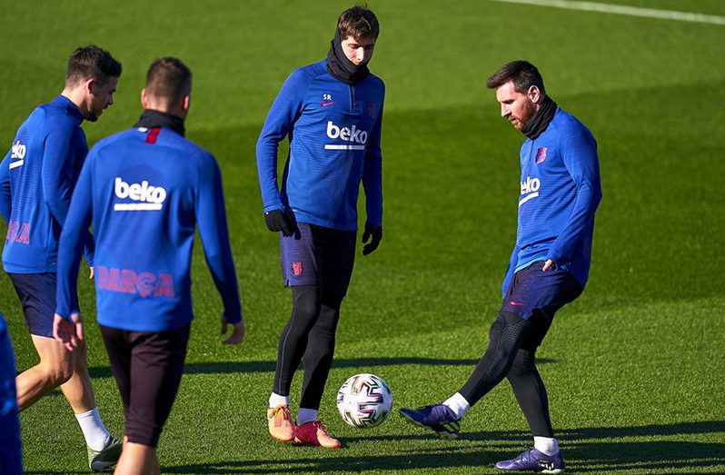 Lionel Messi and Sergi Roberto of FC Barcelona during a training session (Getty Images)