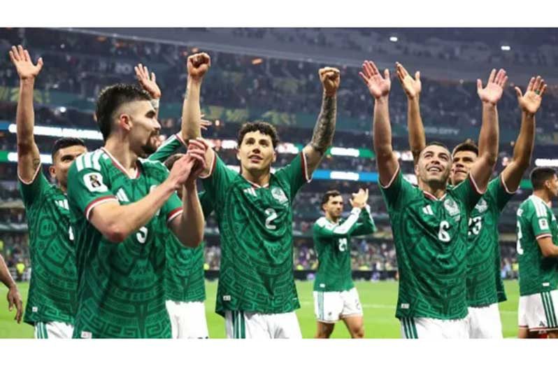 Mexico cruised into the last 16 of the World Cup with a comfortable victory over Ecuador in a weather-delayed contest at the Azteca Stadium