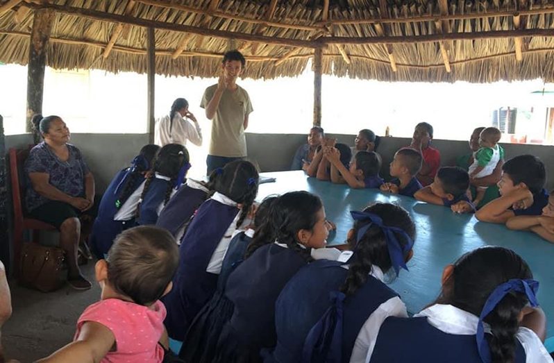 Programme Coordinator Neal Millar engages  South Rupununi students on the importance of the environment