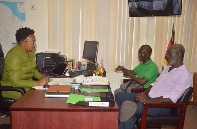 Minister Annette Ferguson (left) meeting with Wayne Junor and Stanley Forde (right)