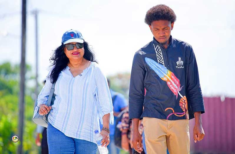 Minister of Human Services and Social Security, Dr Vindhya Persaud, alongside Toshao of the community of Kimbia, Antwan Gordon (MHSSS photos)