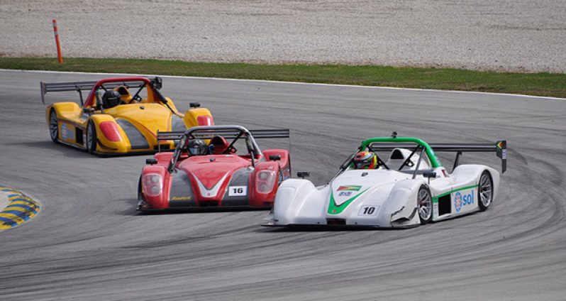 Calvin Ming, (right) leads Stuart Maloney (centre) and Sean Maloney (third)
