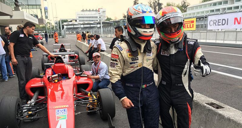 Calvin Ming (right) stands with team-mate Axel Matus following the first race of the final round of F4 action in Mexico. Behind them is Calvin’s F4 Machine.