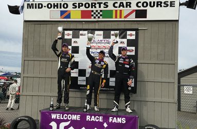 Calvin Ming (centre) stands on the podium with Phillippe Denes and Peter Portante after the 11th race of the F1600 series.