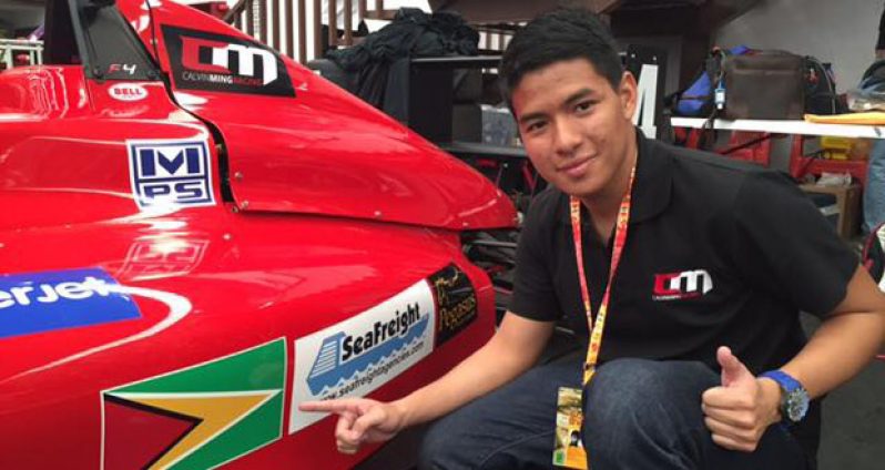 Calvin Ming poses with his Mygale F4 machine before qualification