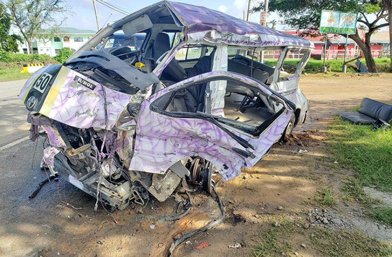 The mangled minibus on the Fairfield, Mahaicony Public Road following an accident which claimed the lives of five persons in December 2019