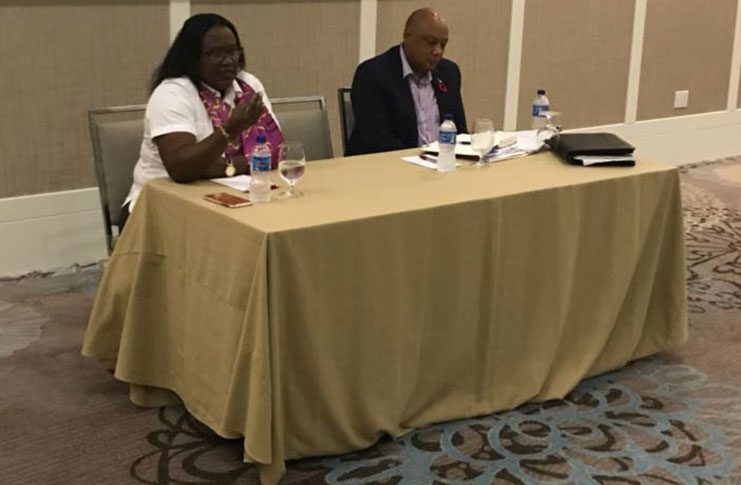 Ministers of Natural Resources, Raphael Trotman and Simona Broomes address members of the National Mining Syndicate, on Friday at the Marriott Hotel