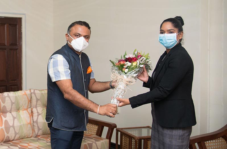 Public Service Minister, Sonia Parag, receives a token from the Indian High Commissioner, Dr. K.J. Srinivasa (DPI photo)