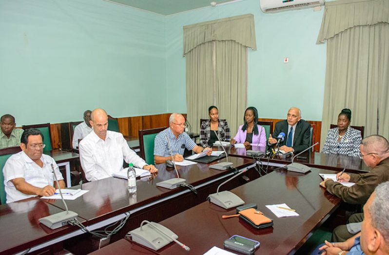 Minister of Communities, Ronald Bulkan and Minister responsible for Housing, Valerie Adams-Patterson with regional officials at the meeting at Public Buildings, Brickdam, Georgetown on Thursday