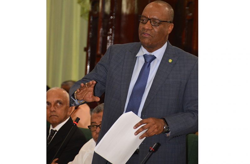 Minister of State Joseph Harmon responding to questions during Consideration of Budget Estimates 2019 on Monday (Adrian Narine photo)