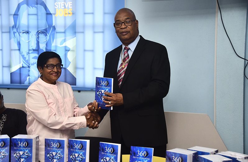 Minister of Public Works, Bishop Juan Edghill and author, Janet Dorie