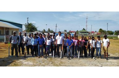 Minister Charles Ramson with a group during a training session