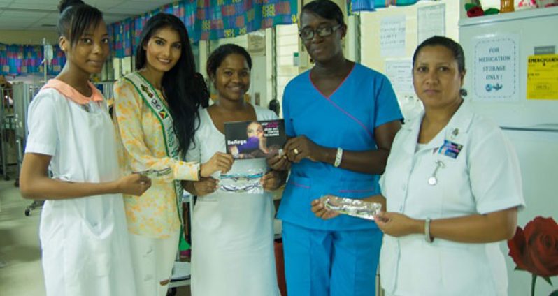 Miss Guyana World and officials from the GPHC