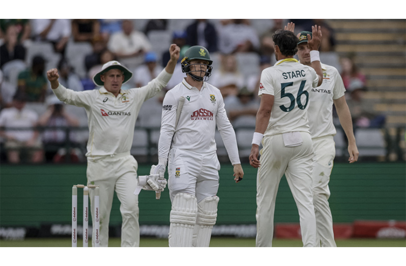 Australia's Mitchell Starc celebrates after dismissing South Africa's Ryan Rickelton on day one of the third Test at Newlands Stadium in Cape Town on Tuesday ( Photo: AFP)