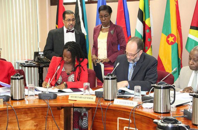 CARICOM Secretariat and UN Women sign MOU: L-R (sitting): UN-Women rep. Ms. Toni Brodber CARICOM Secretary-General, Amb. LaRocque & Hon. Carl Greenidge, Minister of Foreign Affairs, Guyana and Chair of the Community Council. L-R (standing) Mr. Neville Bissember and Barbara Vandyke, Office of the Secretary-General
