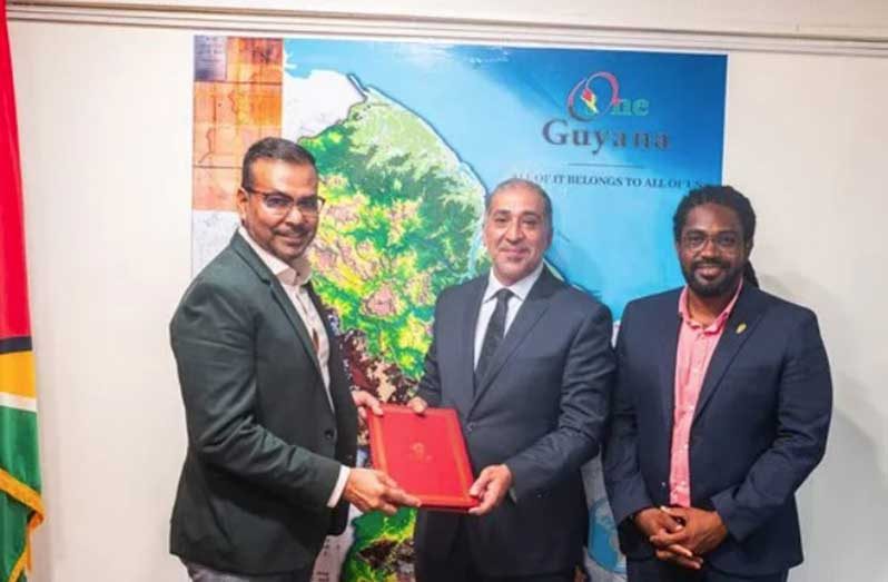 Foreign Secretary and Chairman of the PAC Robert Persaud, along with Commissioner Jason Fraser signed the agreement with Acting Charge d’Affaires in the Embassy of the State of Qatar to the Cooperative Republic of Guyana Mohammed Ebrahim Al Rumai on Wednesday