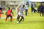 Male action in last weekend’s ExxonMobil-sponsored U-14 schools football tournament.