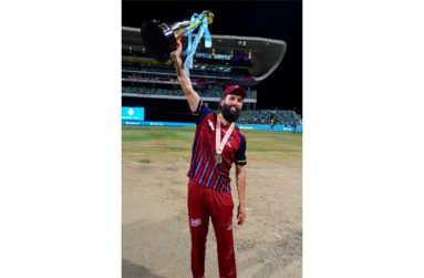 Antigua and Barbuda Falcons skipper, Moeen Ali, holds aloft the CPL trophy