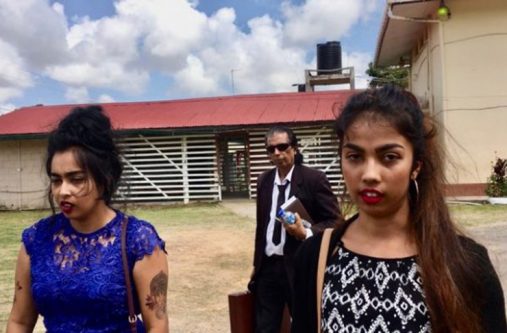 Hemwattie “Mona” Singh and Yashmanie “Tina” Ramsew with their attorney Saphier Husain in the background.