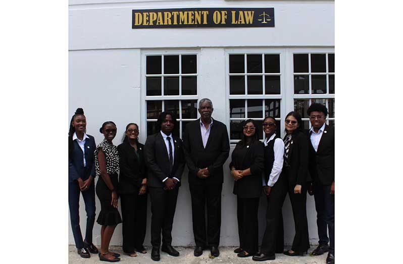 Retired Justice Kenneth Benjamin (centre) witnessed the official passing of the torch to the newly elected board members