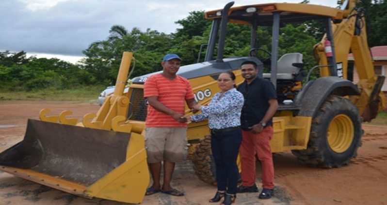 1: Back-hoe donation to Moruca by the Government