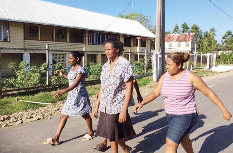 Leonard’s mother Abigail (centre) on Saturday making her way to the scene where her son’s body was found after he was missing for a few days