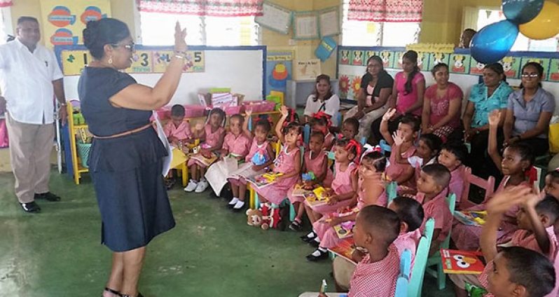 Mrs Nagamotoo interacts with children of the Vergenoegen Primary school Wednesday (Office of the Prime Minister photo)